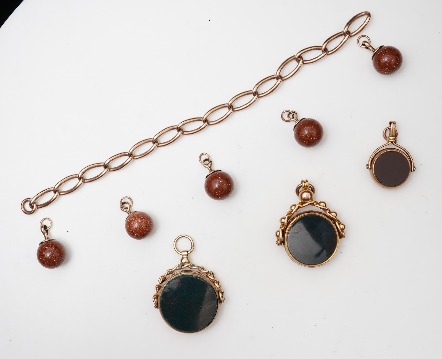 A collection of gold jewels and accessories, early 20th century